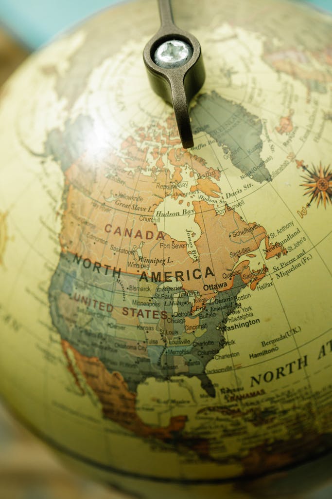 Close-up of a vintage globe focusing on North America with detailed outlines.
