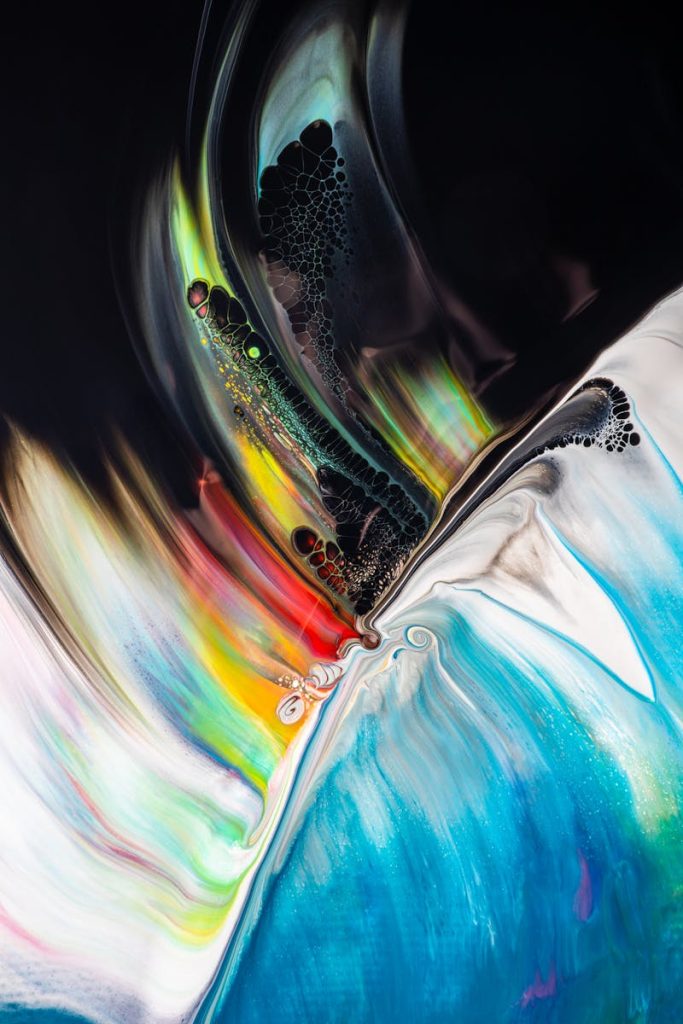 Akrylika (Acrylic Art) Dynamic abstract artwork featuring vibrant swirling colors and motion effects.