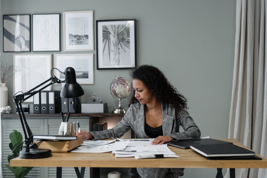Globe and Mail Careers — A Complete Guide to Working at One of Canada’s Top News OrganizationsBusinesswoman evaluates documents at a modern desk in a stylish office setting.