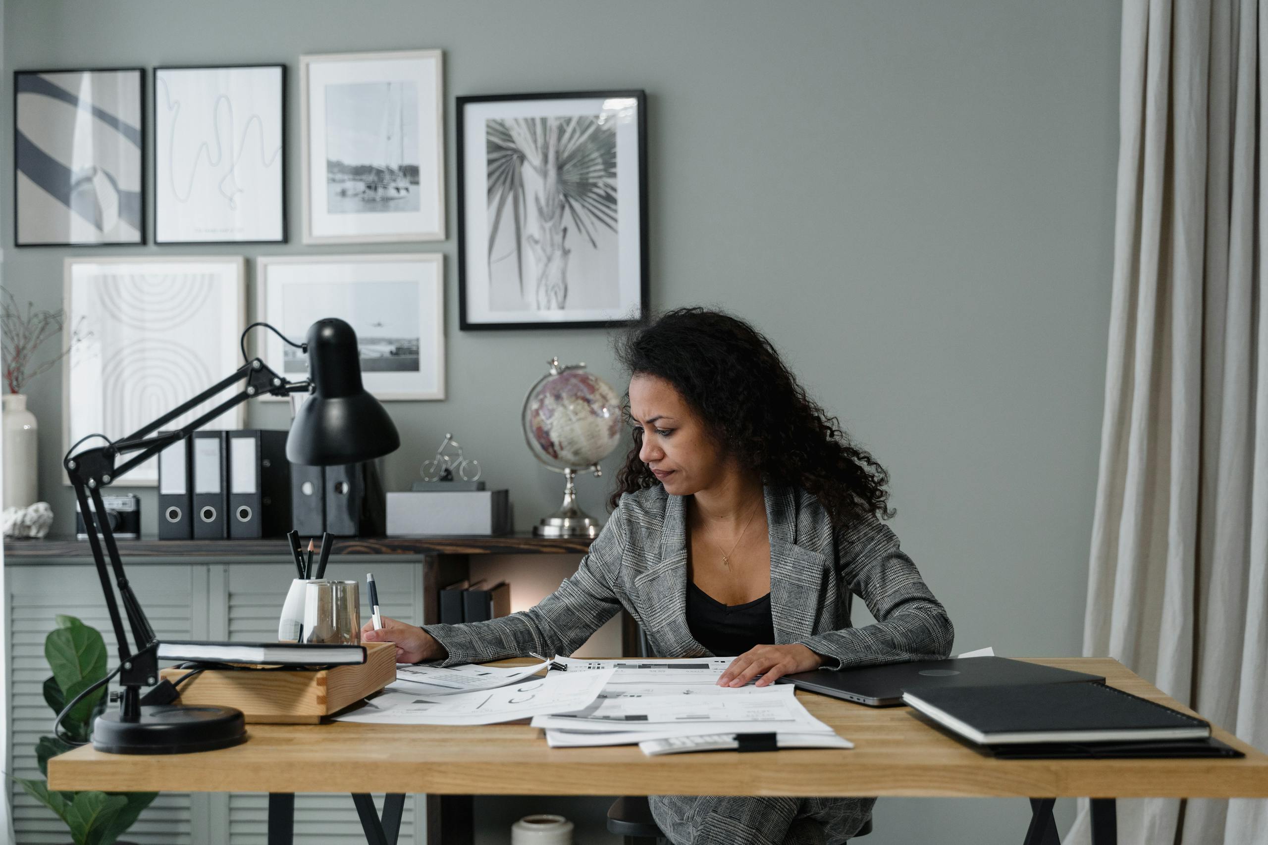 Globe and Mail Careers — A Complete Guide to Working at One of Canada’s Top News OrganizationsBusinesswoman evaluates documents at a modern desk in a stylish office setting.