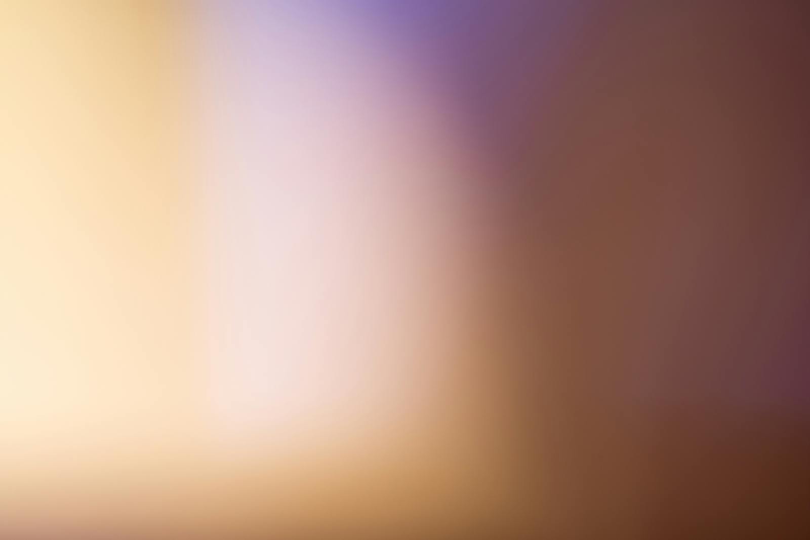 MMSBRE:A soothing abstract blurred gradient background with warm tones.