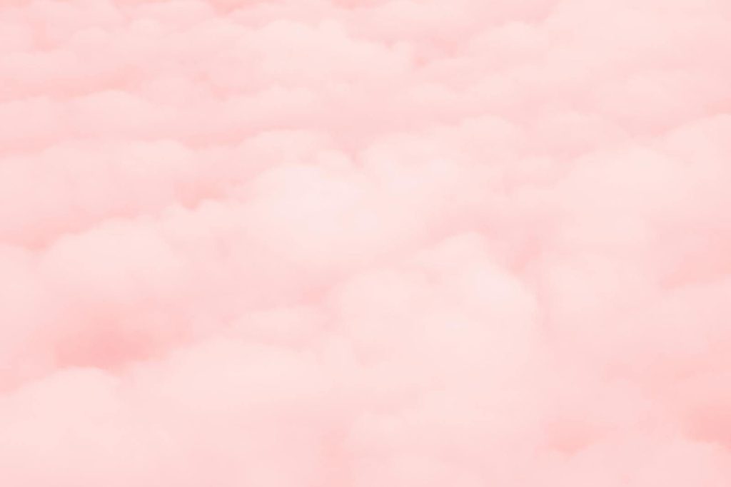 A serene and soft pastel pink cloud background perfect for aesthetics and design.