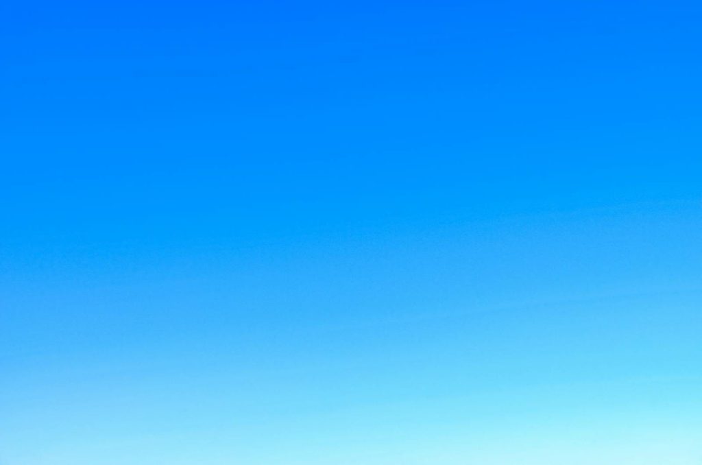 messagenal A serene view of a vibrant clear blue sky with a subtle gradient, perfect for backgrounds.