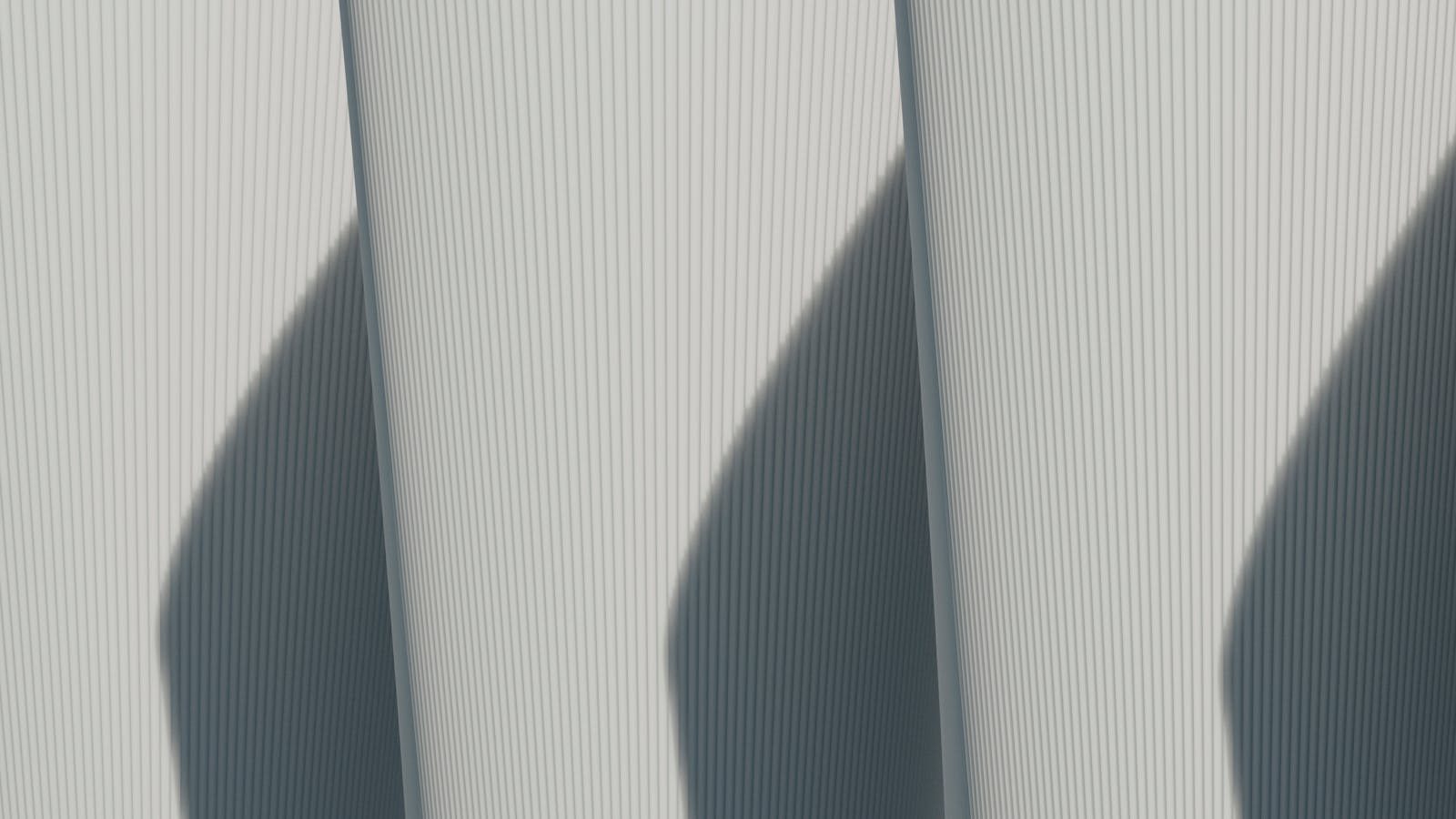 Sixmagazine Abstract architectural image showcasing minimalist lines and strong shadows.