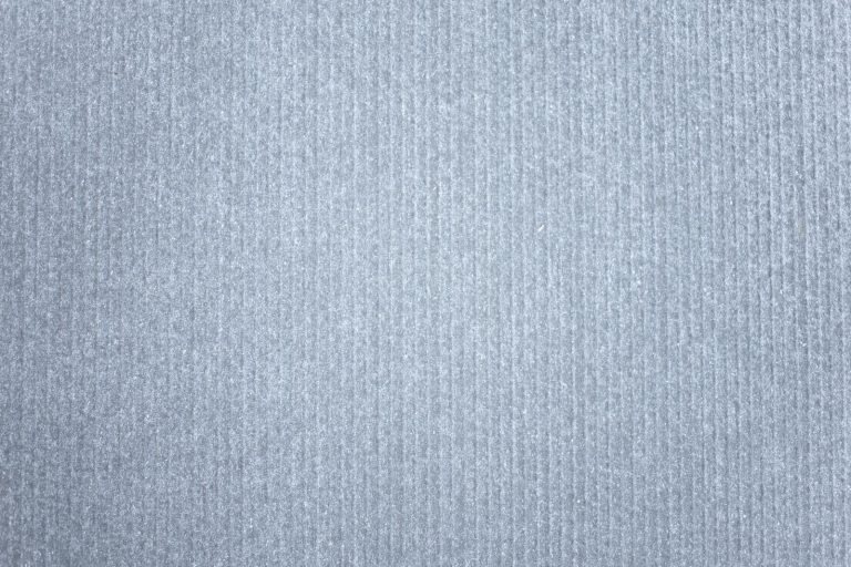 SocialMedia Seamless gray textile background with a linear pattern providing ample copy space.
