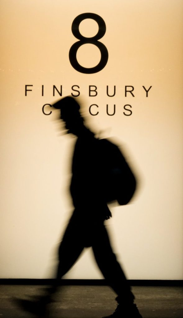 EntrepreneuSix Sigma Certification Online Silhouette of person walking past sign with number eight