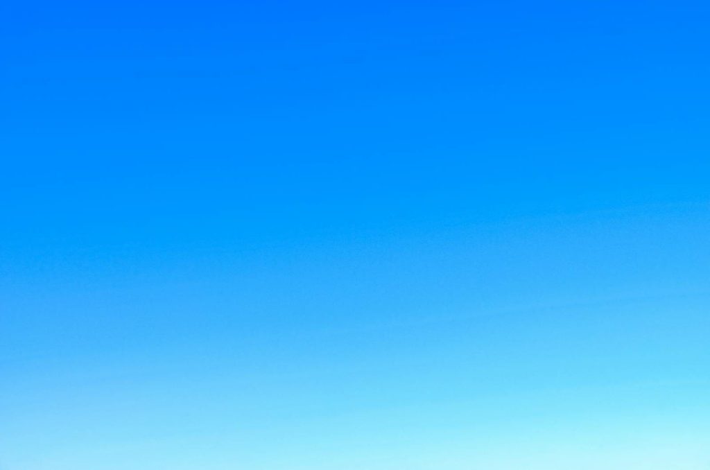 Finnorth A serene view of a vibrant clear blue sky with a subtle gradient, perfect for backgrounds.