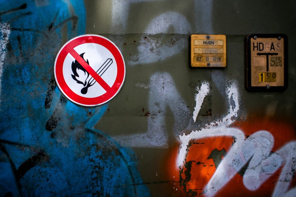 unbanned g a sign on a wall